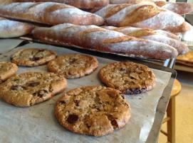 Chocolate chip cookies and fresh baguettes at Bosque Baking Company. Photo by Kenneth Chavez