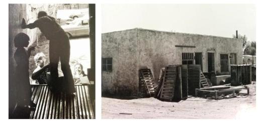Unloading the TCW truck and palettes stacked against back of building - photo by Jeffrey Finer